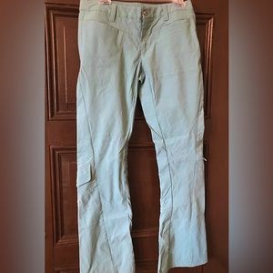 Athleta pale powder, blue utilitarian pants with leg side pockets.